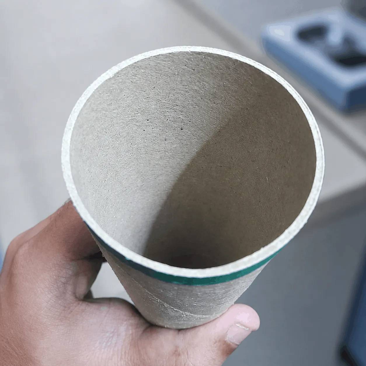 Close-up of the large-end opening and inner wall of a paper cone